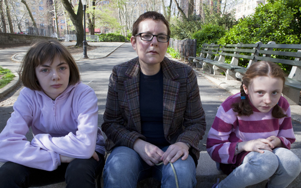 Susan Angel and her daughters Anny (L) and Imogen, who were placed in foster care during a family dispute.