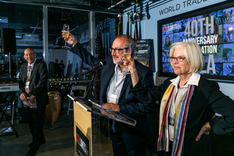 Gala co-chairs Andy Breslau and Elizabeth Cooke Levy toast the honorees and City Limits' four decades of work.