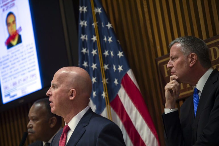 Surveillance cameras caught Commissioner James O'Neill and Mayor Bill de Blasio looking in the same direction.