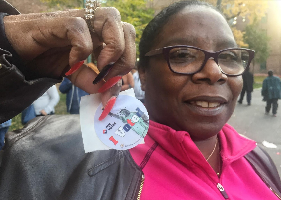 Michelle Ortiz, 51, is a probation officer, waited nearly two hours to vote for Hillary Clinton in Parkchester.