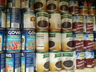 Stacked shelves at the food pantry run by Saint Nicholas of Tolentine Church in University Heights.