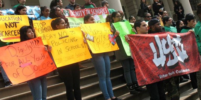 Members of the Urban Youth Collaborative demonstrate at City Hall for a more restorative approach to school discipline.