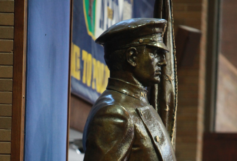 A statue inside One Police Plaza memorializes the NYPD's duty to defend the defenseless. But performing that duty is complex in sex trafficking cases.
