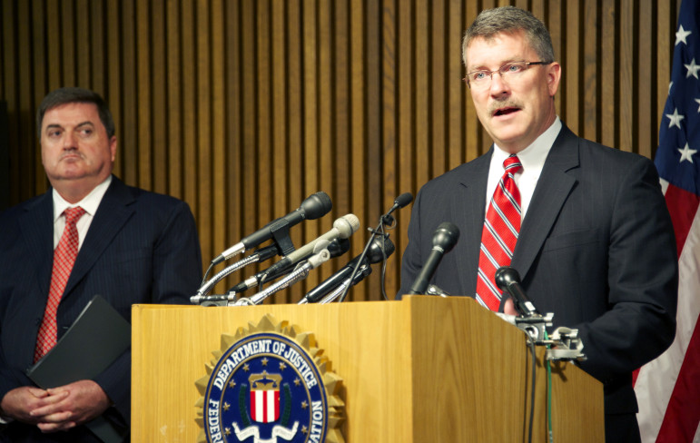 FBI official Ron Hasko and John Ryan, CEO of the National Center for Missing and Exploited Children, announce the 76-city sweep in 2013 that rescued 105 children who were victims of sex trafficking, most of whom had been in foster care.
