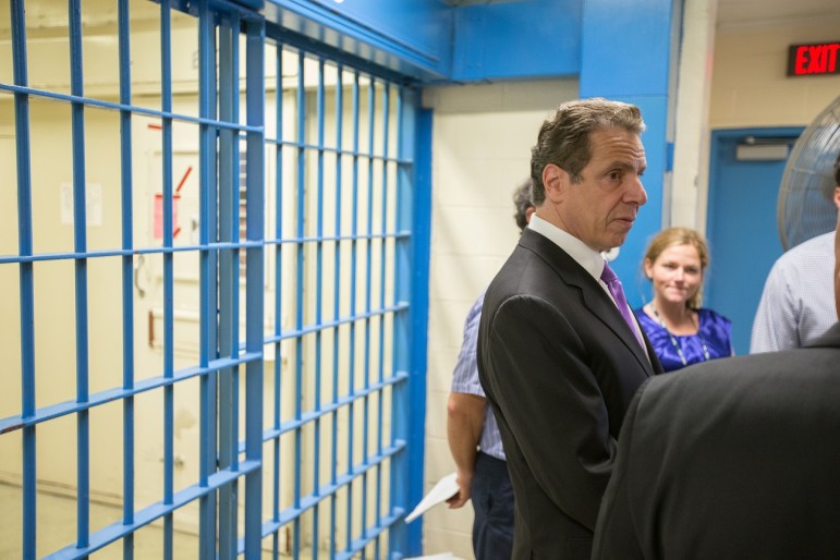 Gov. Cuomo on a recent prison tour. He supports raising the age.