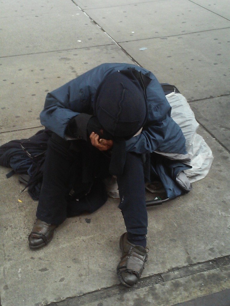A homeless woman on 34th Street. Stereotypes about homelessness confuse the discussion about the extent of the problem.