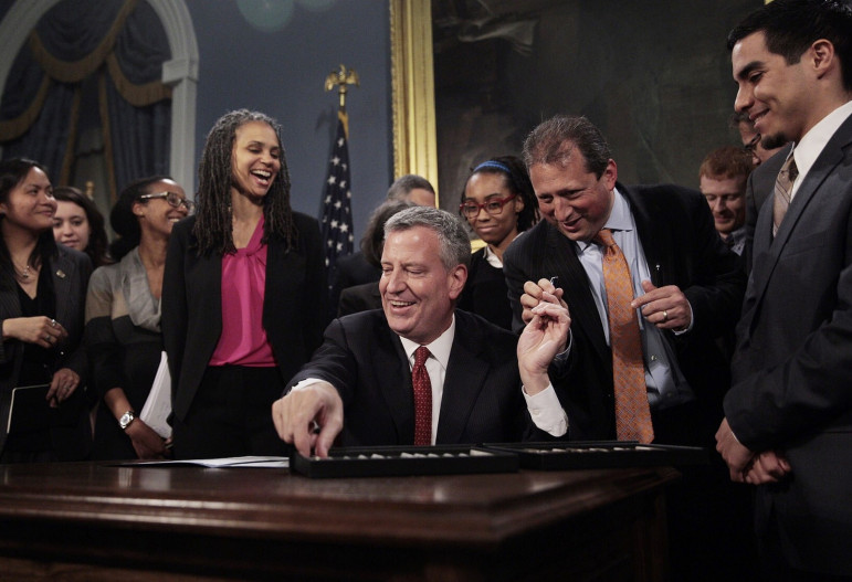 Mayor de Blasio signed the credit-check ban in May.