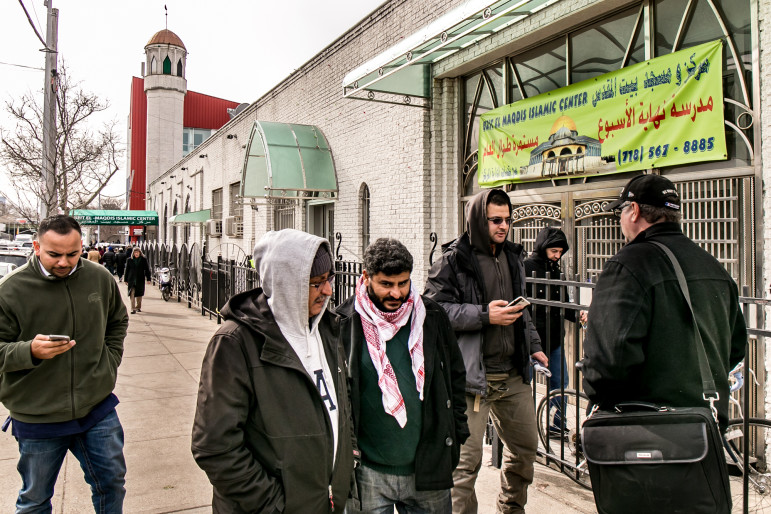 On a recent Friday, men leave the Beit El-Maqdis Islamic Center. The Center is in Sunset Park, just north of Bay Ridge, a neighborhood with a heavy Arab presence where Syrians might be relocated if they came to New York City in any numbers.