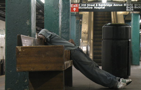 Asleep in the 205th Street-Norwood station. Not an ideal place for a snooze, but probably not a spot that would have been chosen by anyone with better options.