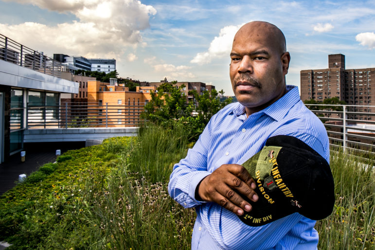 Mark Williams at the roof garden of the Jericho Project where he lives on Kingsbridge Terrace in the Bronx. He has been visiting the VA hospital (that gray building in the background) regularly to exercise and get care for his diabetes.