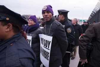 Torres getting arrested at a 2014 protest by airport workers seeking better working conditions. He quickly gained power in the Council after his 2013 election.
