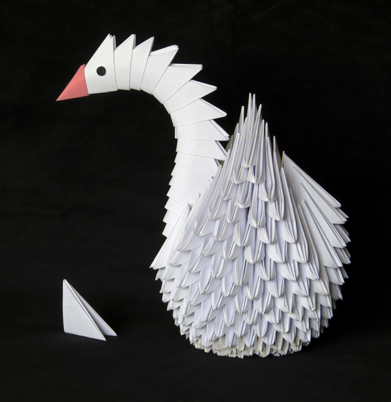 This style of paper folding is known as "Golden Venture" because it was pioneered by survivors of the wreck who used the technique to create elaborate works during the long incarceration they endured as the Clinton administration decided what to do with them.