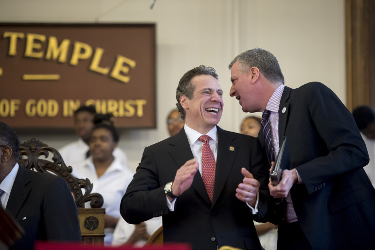 Gov. Cuomo and Mayor de Blasio chuckling in a February 2014 photo. Their disagreement over 421-a has been less hilarious.