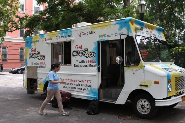 The SchoolFood truck parked near a crosswalk at Rivington Playground in Sarah D. Roosevelt Park now serves 500 meals a day.