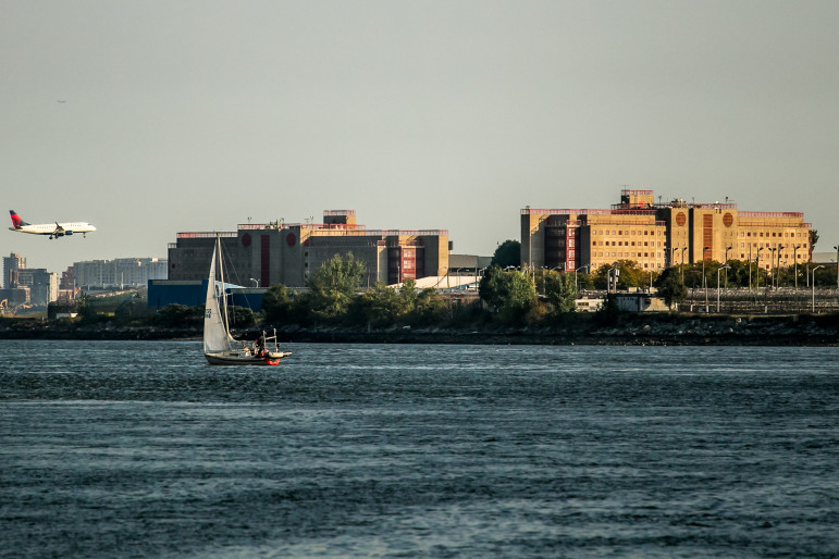George R. Vierno Center on Rikers Island, seen from the Bronx. Deep concern about problems on the island is interwoven with a broader critique of the criminal-justice system.