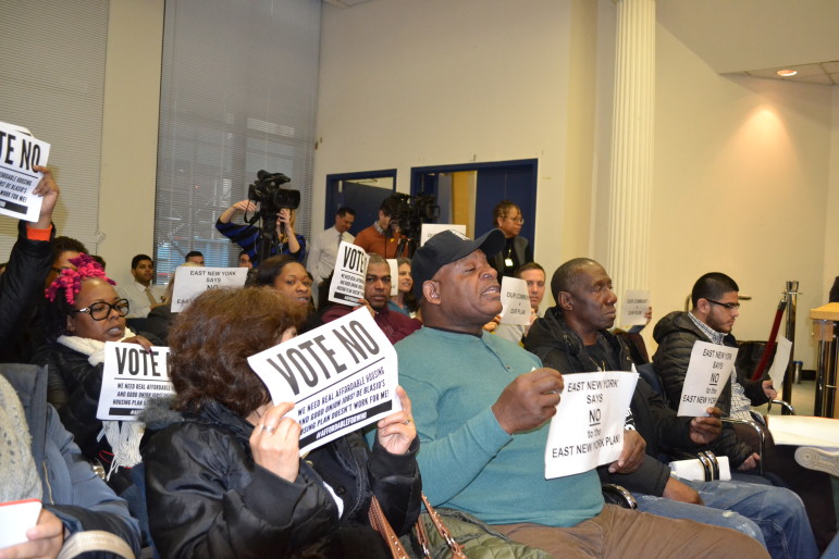 Protesters at the hearing. The de Blasio administration says it will work to ensure that half the new housing created in East New York is affordable.