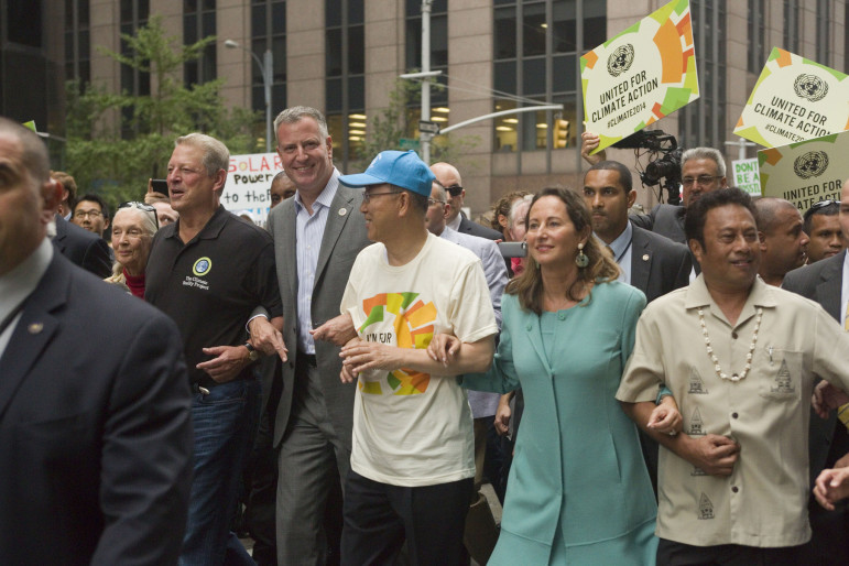 Mayor de Blasio, with former VP Al Gore to his right, walks in the 2014 climate march.