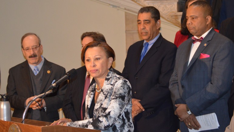 Congresswoman Nydia Velazquez, with Rep. Eliot Engel at left and State Senators Adriano Espaillat and Jesse Hamilton at right.