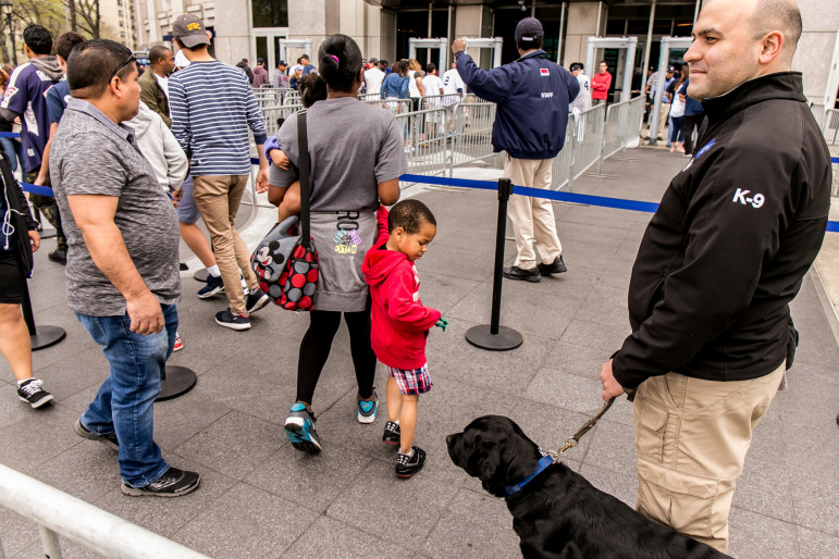 A private security officer outside Yankee Stadium. State regulations and enforcement have failed to track the steady growth of the private-security industry since September 11.