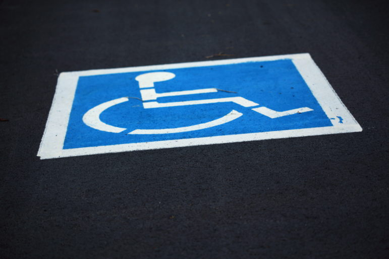 Free_Freshly_Painted_Handicap_Wheelchair_Parking_Sign_in_Parking_Lot_Creative_Commons_(5657947214)