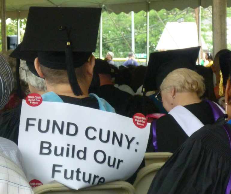 The concerns about CUNY's funding are not new. This graduate wore his worries at the Bronx Community College commencement in 2010.