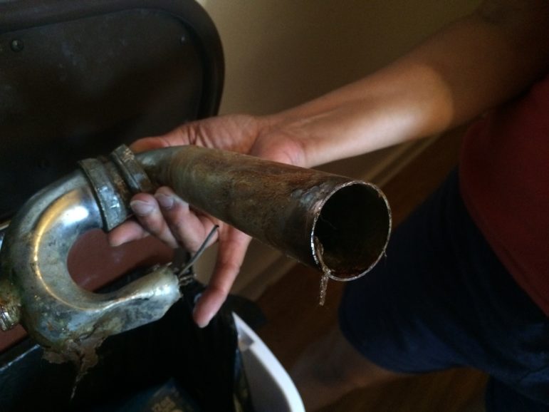 While she waited for her landlord to fix this pipe, Ketty Marcucci had to brush her teeth over the bathtub.
