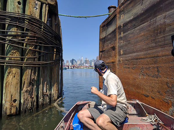 Willis Elkins of the Newtown Creek Alliance at a point in the creek where its industrial feel gives way to a distant view of Manhattan.