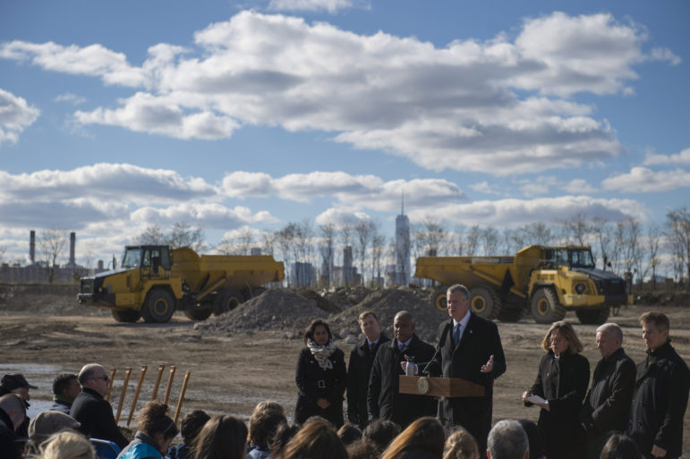 Mayor de Blasio breaks ground on Phase II of Hunter’s Point South in November 2015. His administration has faced pressure from some quarters to increase the community set-aside in such projects even as it fights a lawsuit seeking to eliminate those preferences altogether.