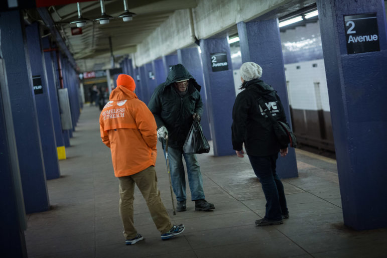 Homeless outreach workers in the NYC subway