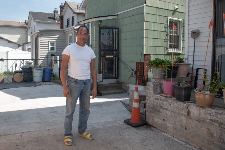 Compton Meerabux in front of his house in Bricktown, Queens. Sept. 10, 2022. Photo by Nikol Mudrová