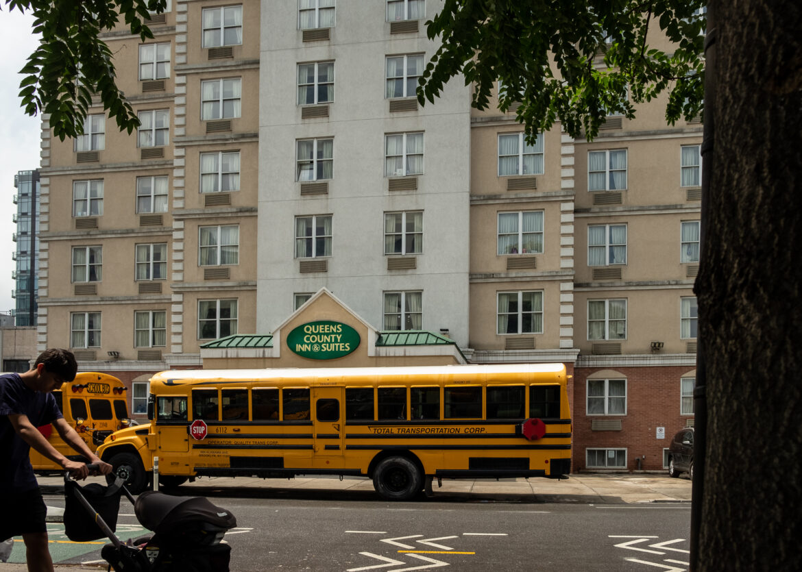 On Friday, two school buses arrived to relocate migrant families staying at an emergency shelter hotel in Queens. Most families resisted the move.